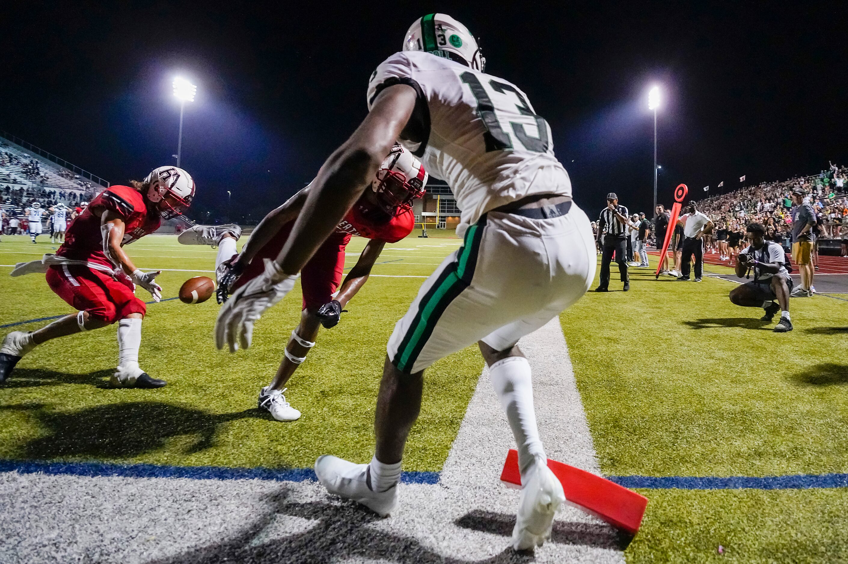 Southlake Carroll wide receiver RJ Maryland (13) can’t make a play in the end zone as...