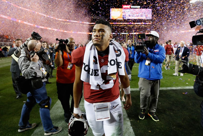 SANTA CLARA, CA - JANUARY 07:  Tua Tagovailoa #13 of the Alabama Crimson Tide walks off the...