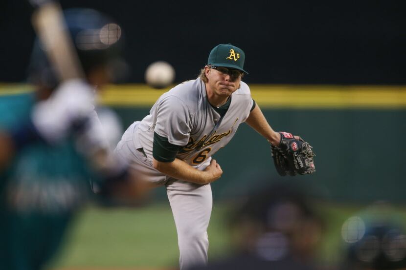 SEATTLE, WA - SEPTEMBER 07:  Starting pitcher A.J. Griffin #64 of the Oakland Athletics...