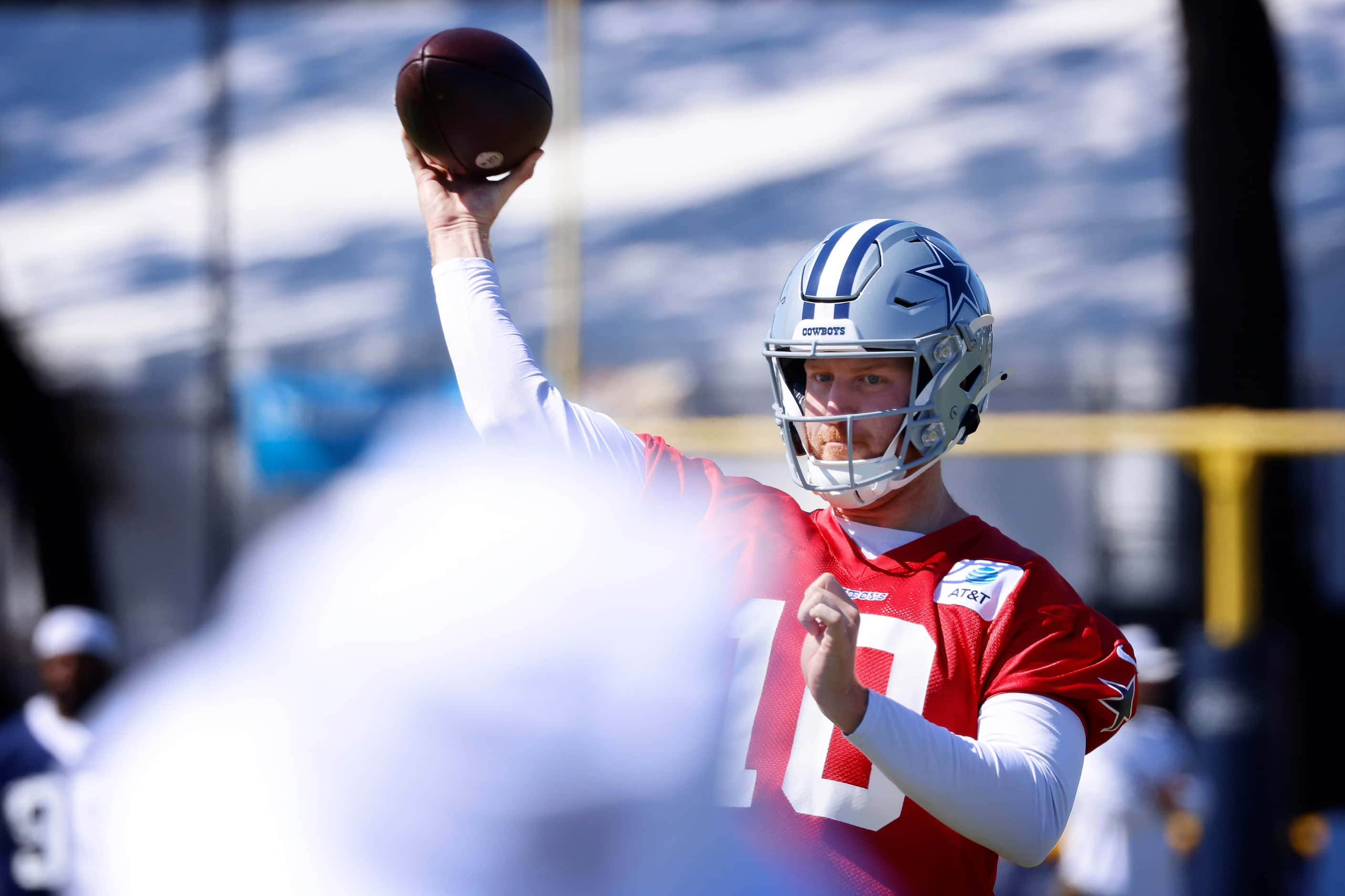 Dallas Cowboys quarterback Cooper Rush (10) throws a pass during a mock game play in Oxnard,...