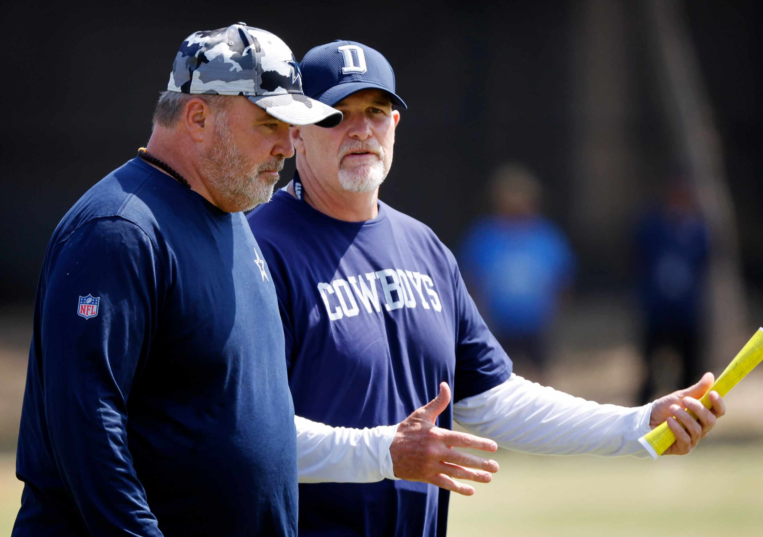 Dallas Cowboys head coach Mike McCarthy and defensive coordinator Dan Quinn (right) visit...