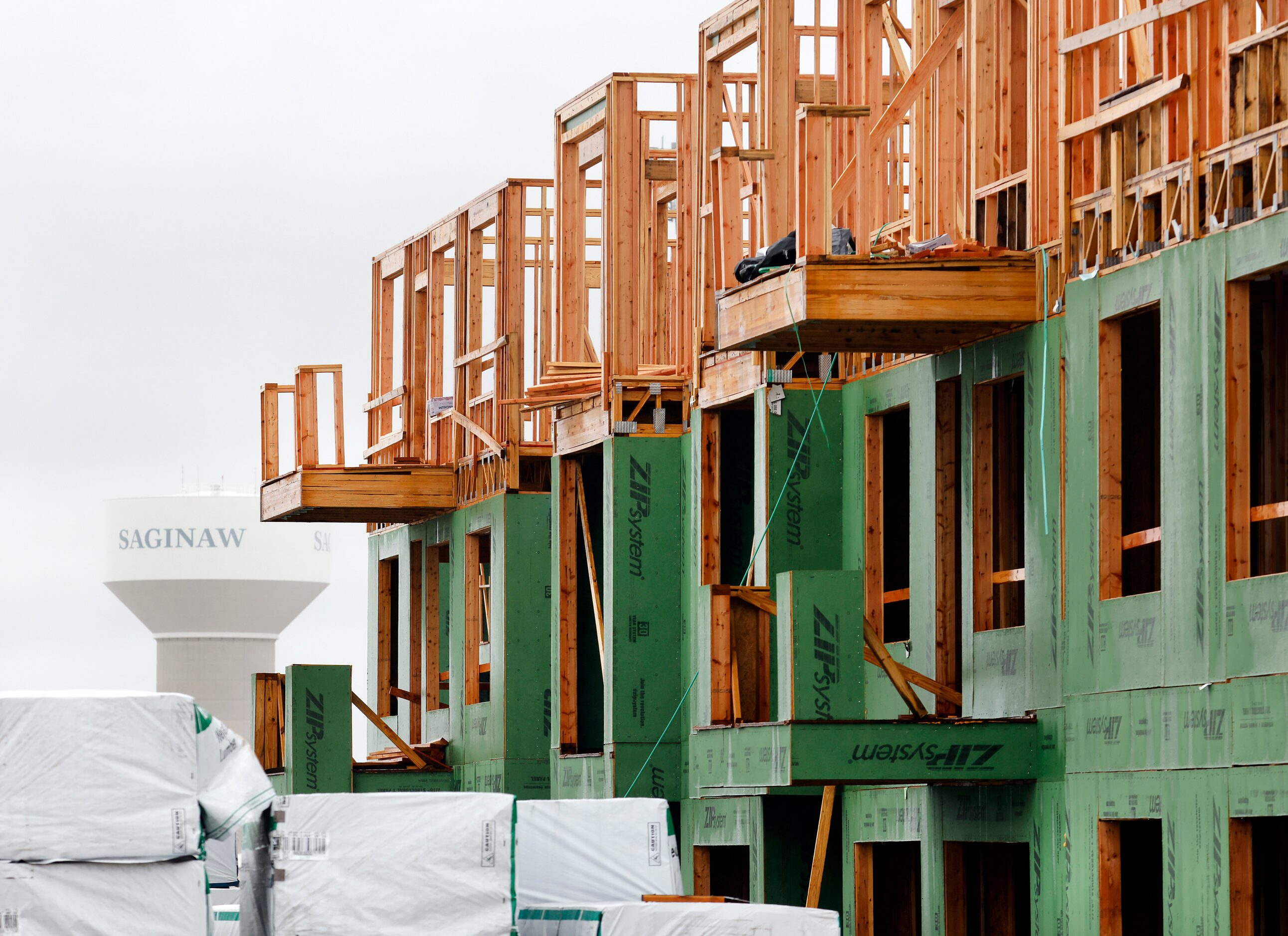 Construction continues on multifamily residences at the Beltmill development in Saginaw.