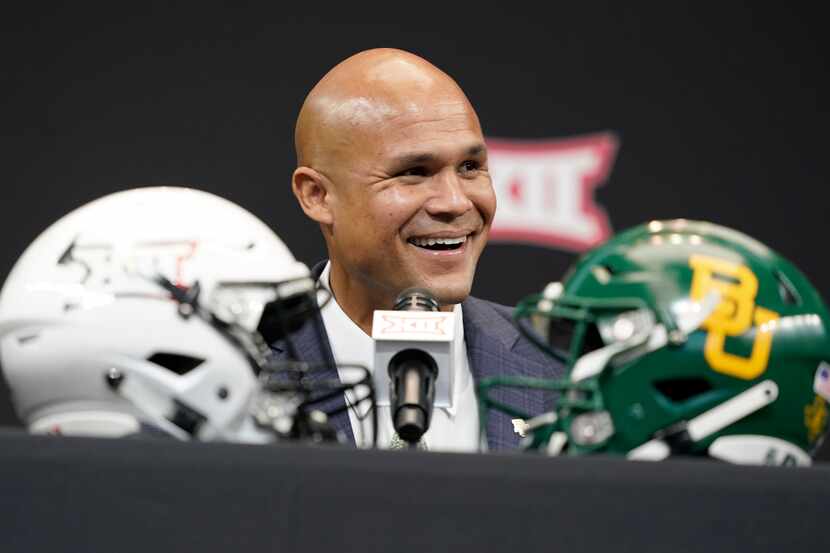 Baylor head coach Dave Aranda smiles while speaking at the NCAA college football Big 12...