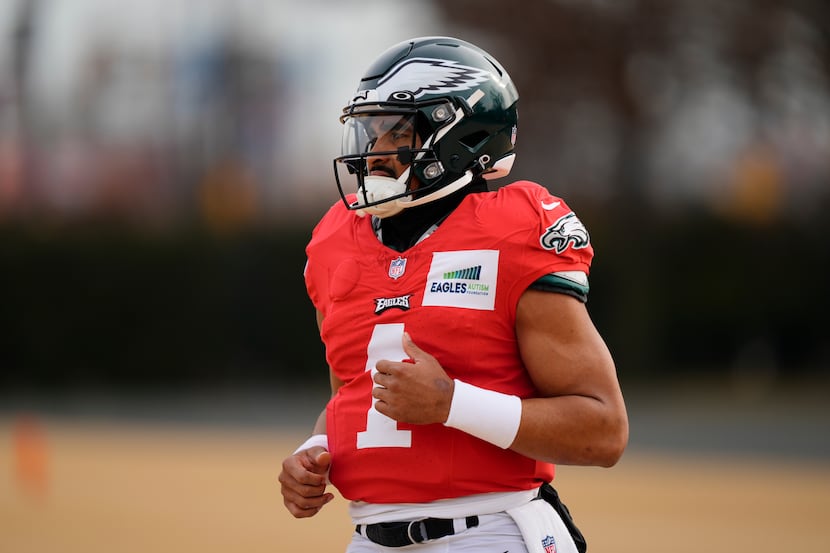 Philadelphia Eagles quarterback Jalen Hurts practices at the NFL football team's facility in...