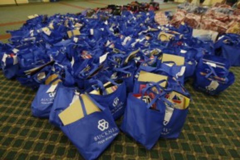  Buckner International in Dallas gathered school supplies for foster children in 2014. (File...