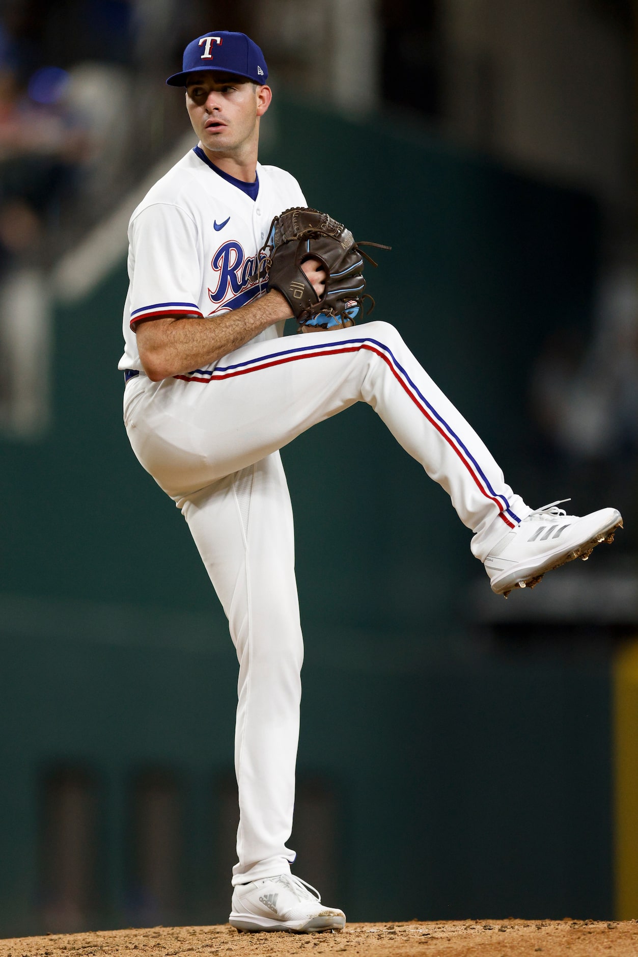 Texas Rangers starting pitcher Cody Bradford (61) delivers a pitch during the first inning...