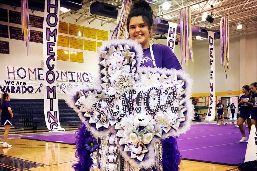 Alvarado High senior Brittany Eicker wore a 'Texas-sized' mum  to their homecoming pep...