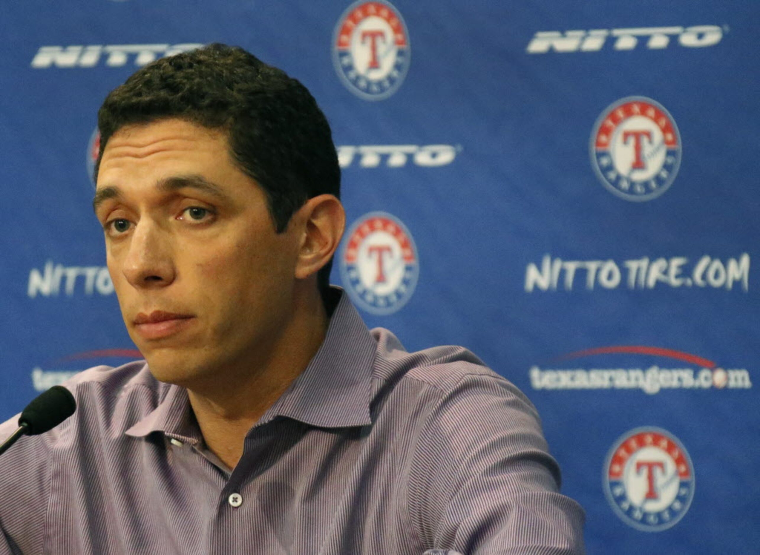 Texas general manager Jon Daniels talks with the media after the Rangers' 4-0 loss during...