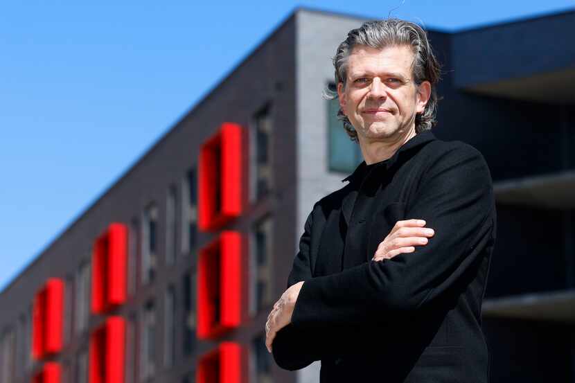 Architect Ron Stelmarski  stands in front of the Galbraith apartments, one of his projects,...