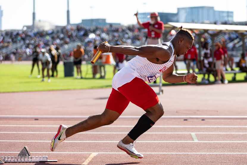 Caden Durham leads off the boys' 4x100-meter relay for Duncanville at the UIL Track & Field...