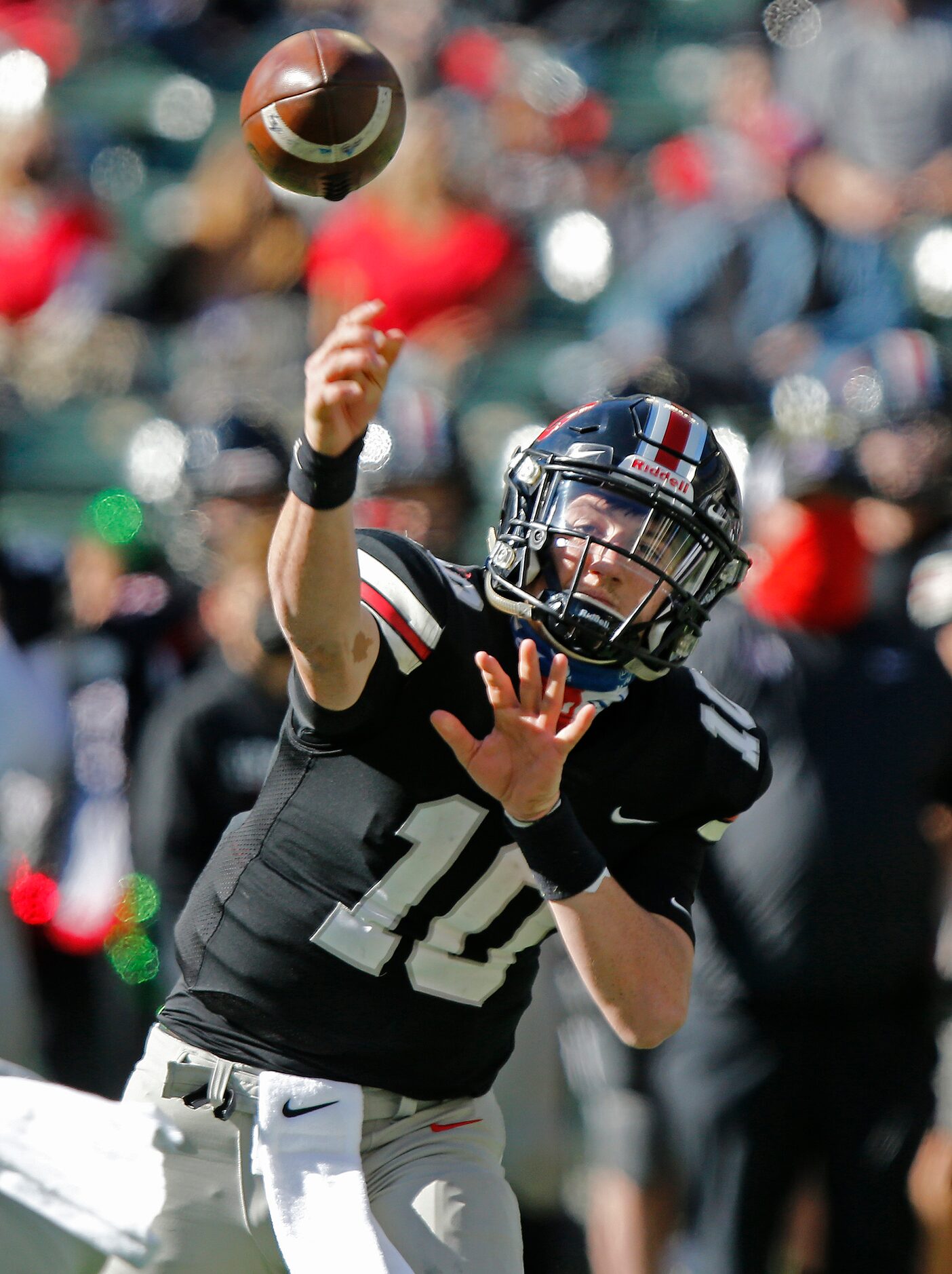 Lovejoy High School quarterback R.W. Rucker (10) throws a [ass during the second quarter as...