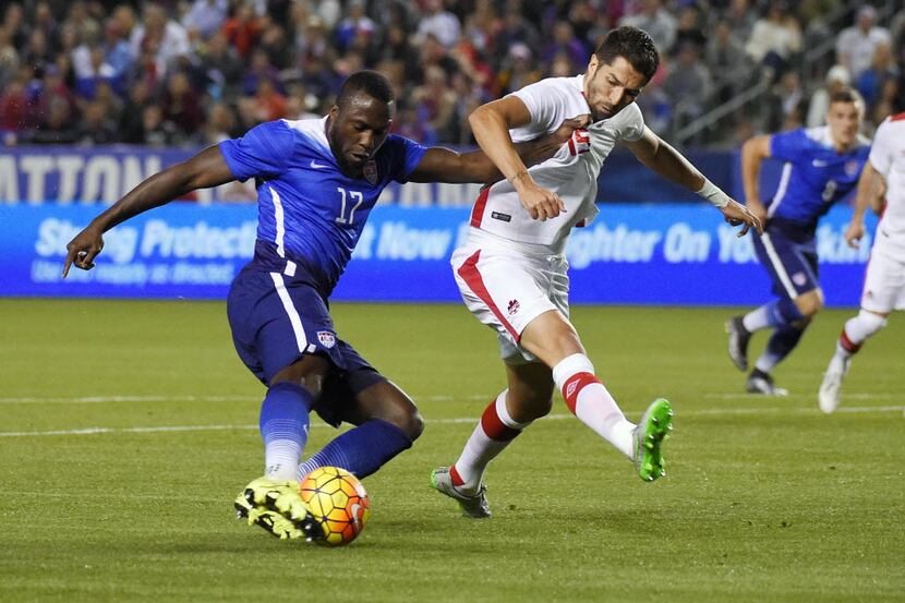 FILE - In this Friday Feb. 5, 2016, file photo, United States' Jozy Altidore, left, tries to...