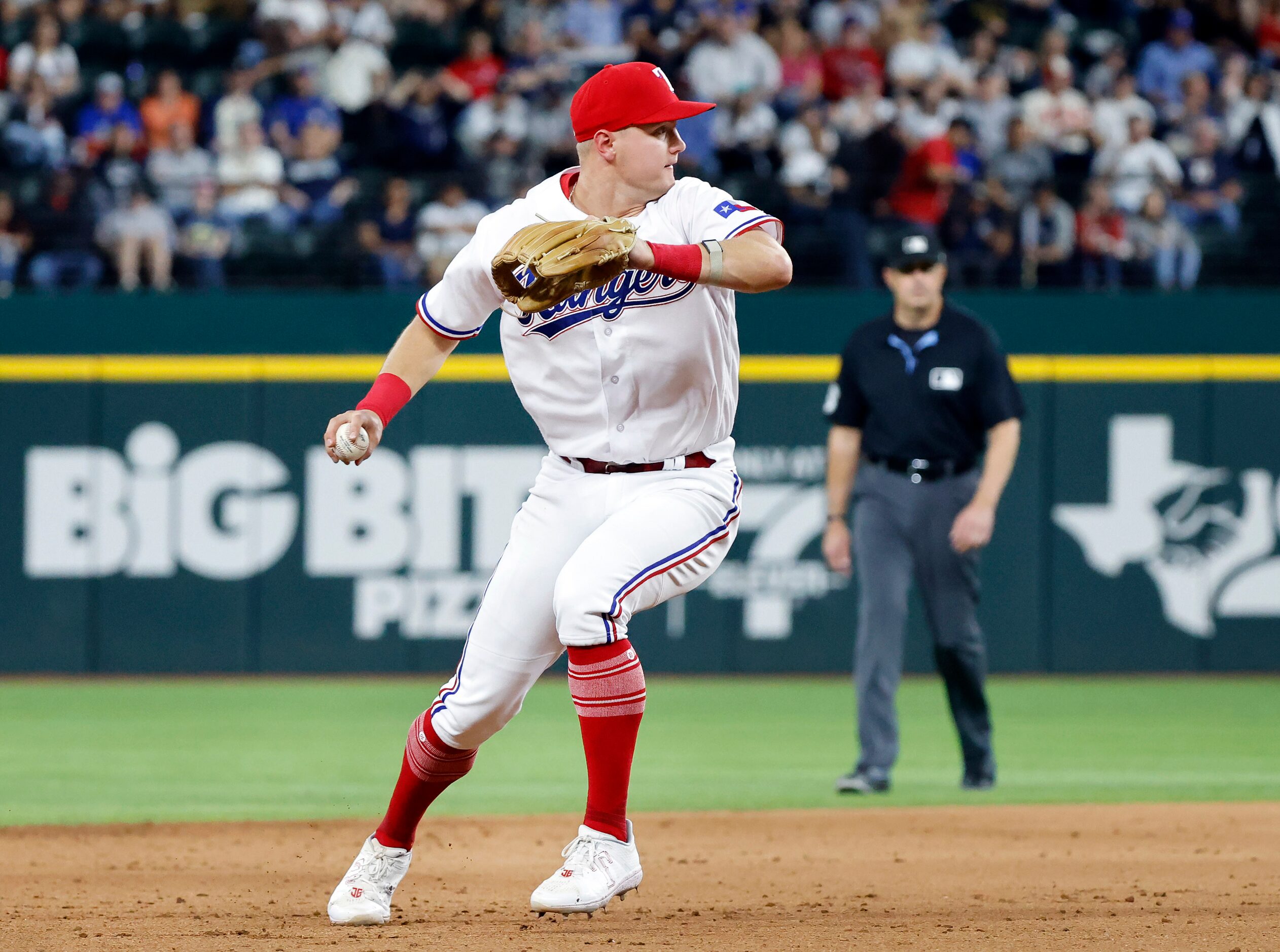 Texas Rangers third baseman Josh Jung (6) spins and throws out New York Yankees center...