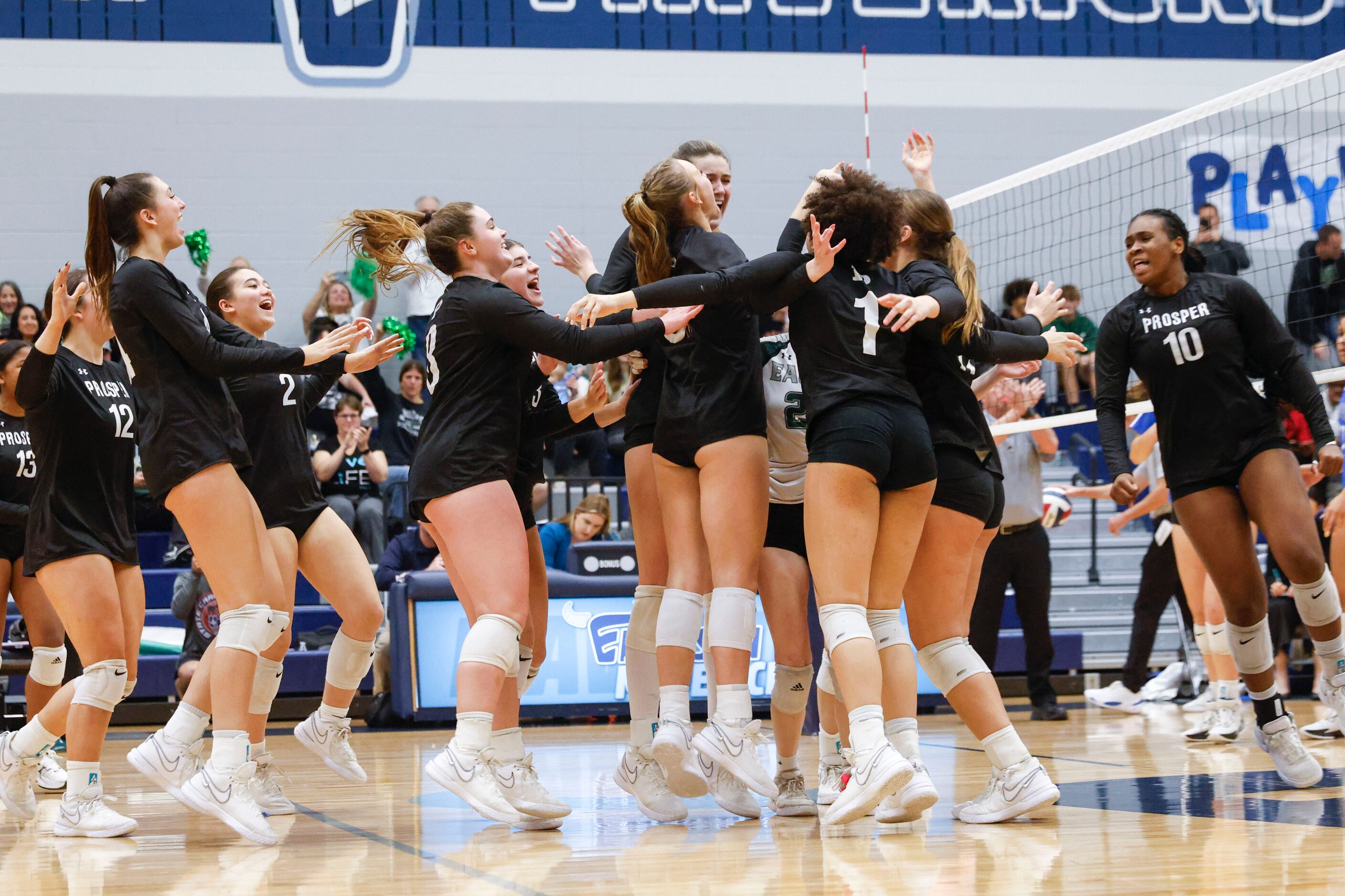 Prosper high’s players celebrate after winning against Plano West during class 6A...