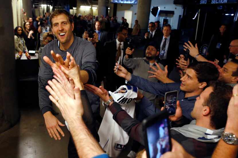 Dallas Mavericks forward Dirk Nowitzki (41) greets fans after defeating the Los Angeles...