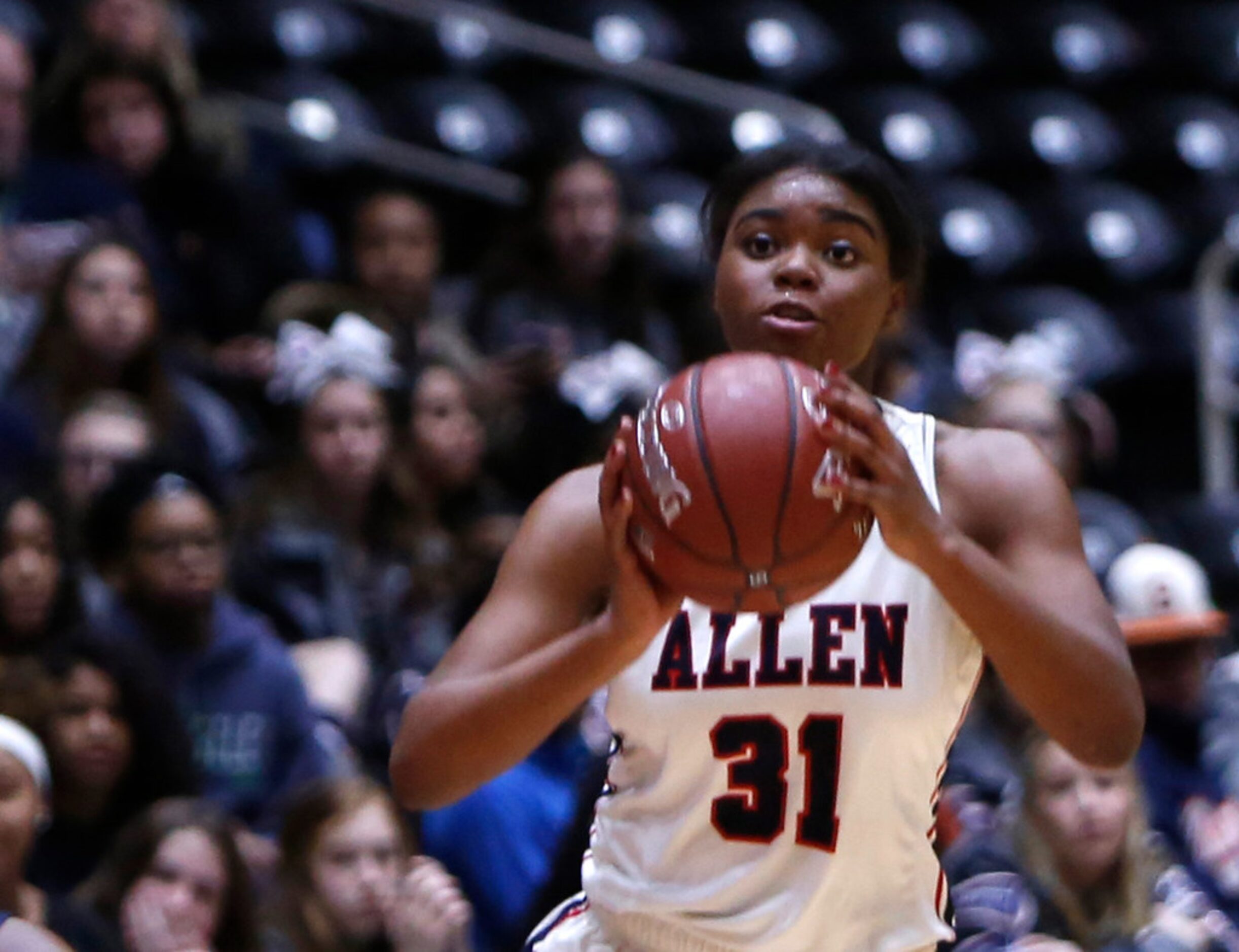 Allen guard Nyah Green (31) looks to pass to a teammate during first half action against...