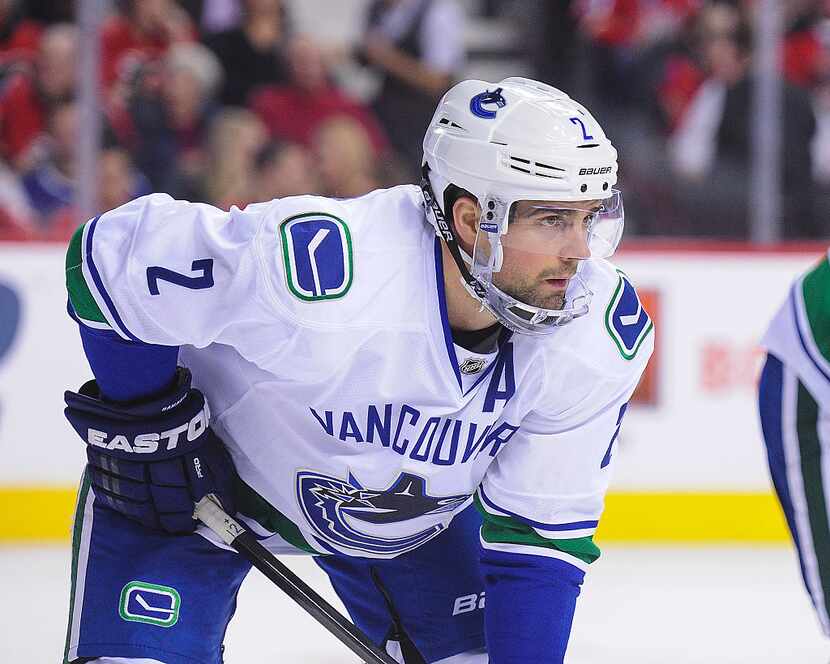 CALGARY, AB - FEBRUARY 19: Dan Hamhuis #2 of the Vancouver Canucks in action against the...