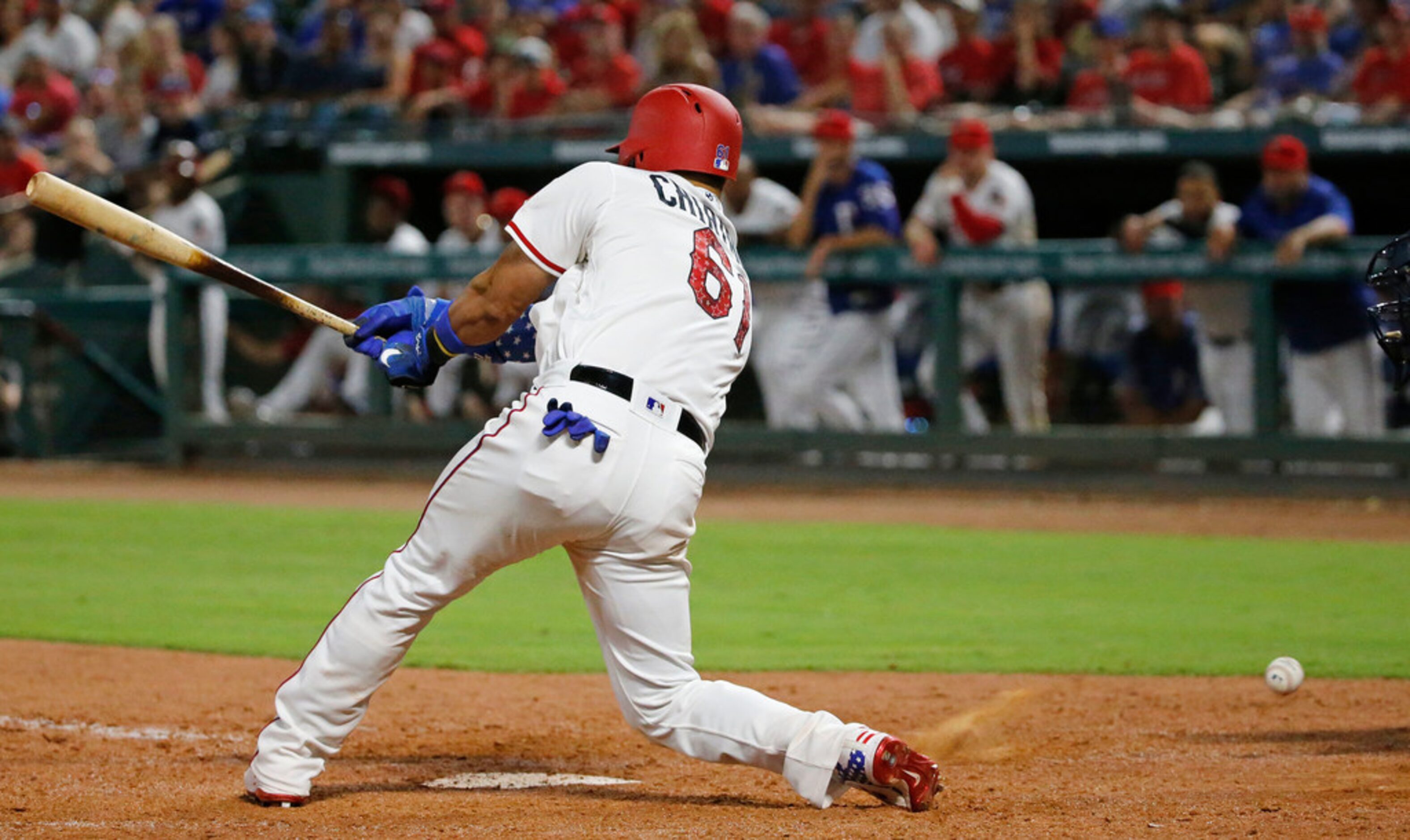 Texas Rangers Robinson Chirinos (61) strikes out to end a Rngers threat in the bottom of the...