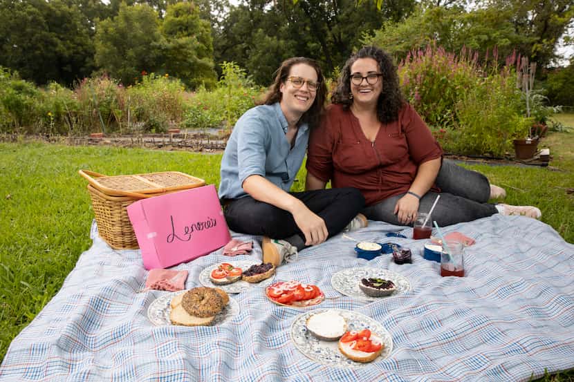 Seth and Jessica Brammer of Lenore's Bagels have a picnic at Bishop Hill Farm Flowers in...