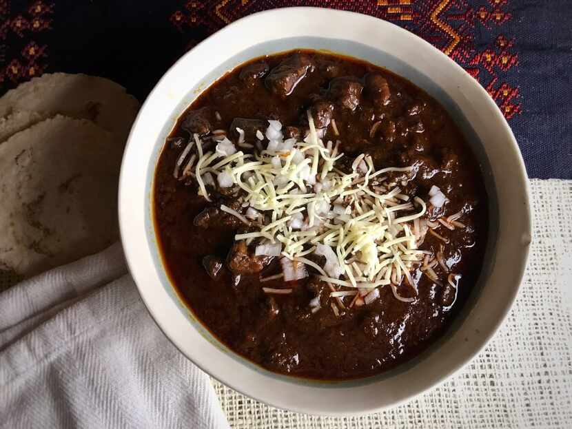 Garnish the chili with chopped onions and grated cheese. Cornbread or handmade tortillas go...
