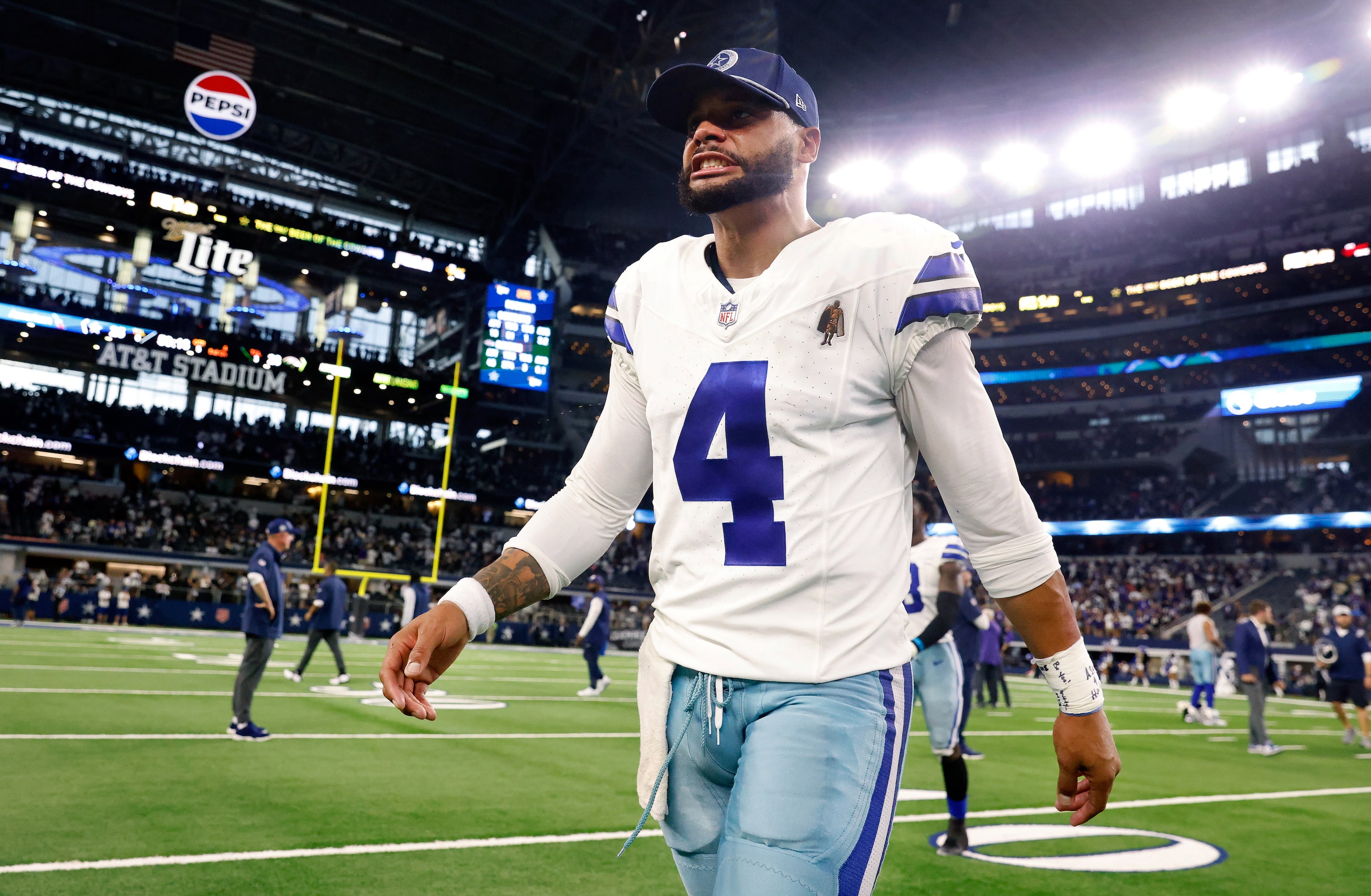 Dallas Cowboys quarterback Dak Prescott (4) walks to the locker room following their 28-25...