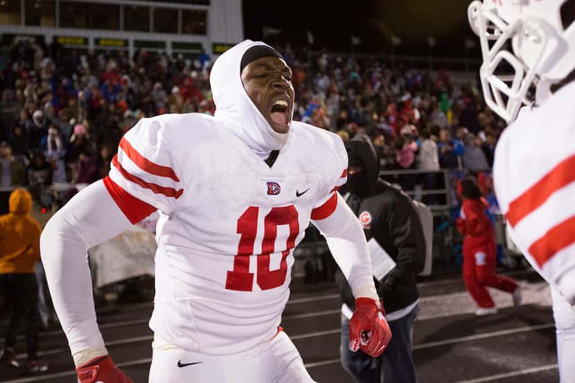 Duncanville linebacker Marcus Mosley (10) celebrates on the sideline during a District 7-6A...