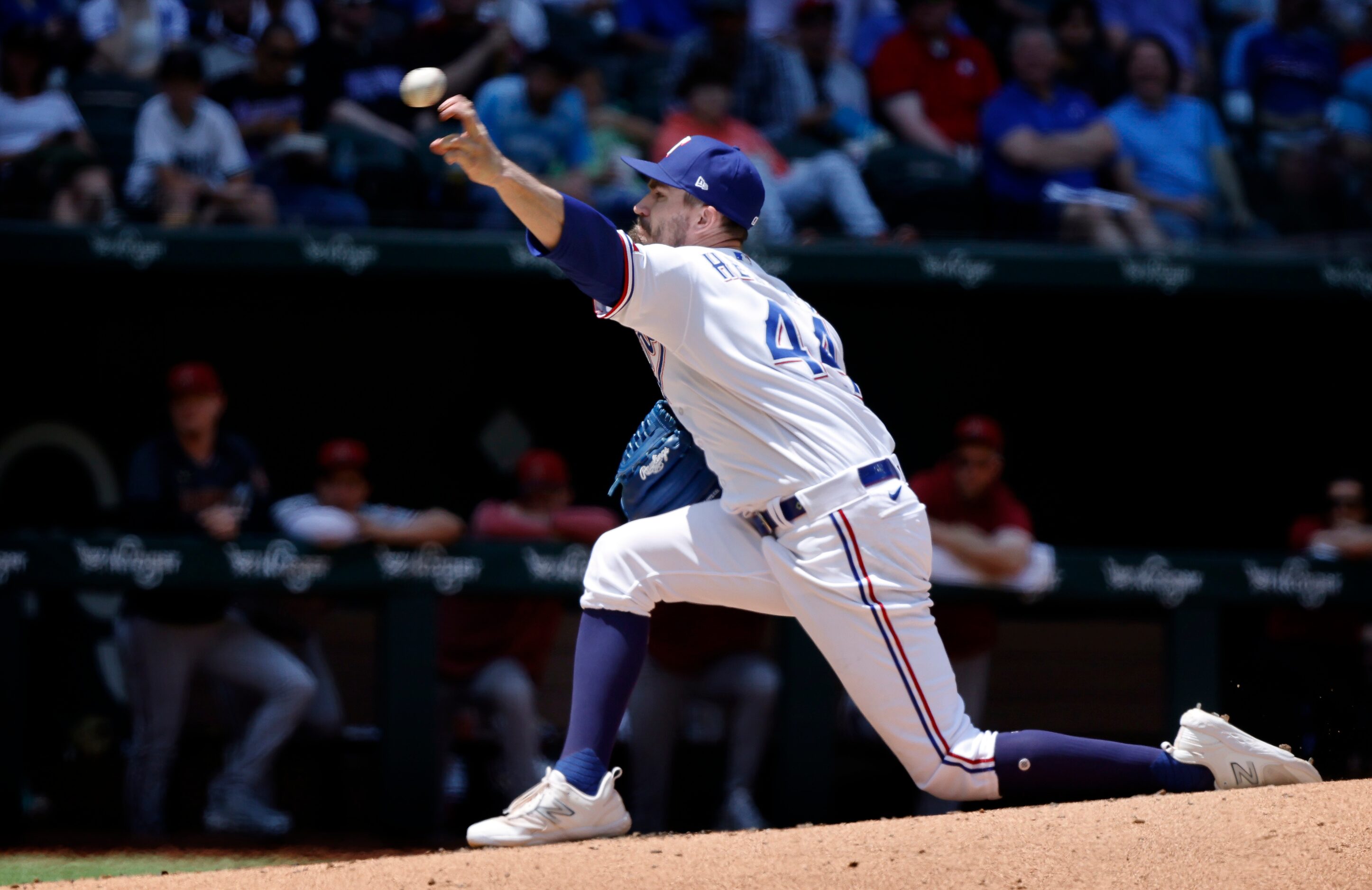 Texas Rangers starting pitcher Andrew Heaney (44) throws during the third inning against the...