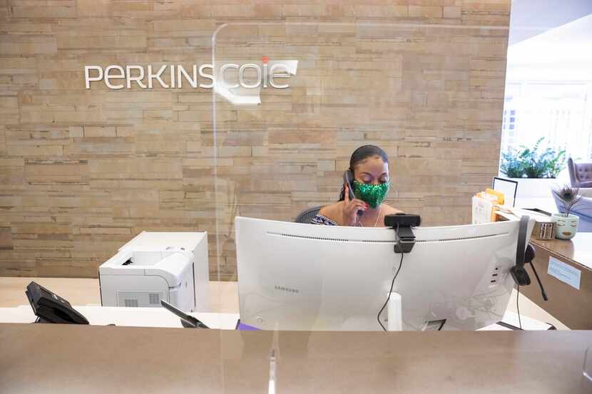 Keisha Mason, receptionist and client service coordinator, answers the phone at the Perkins...