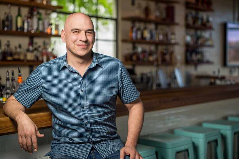 Michael Symon, the chef-host on Cooking Channel TV show Burgers, Brew & 'Que, visits three...