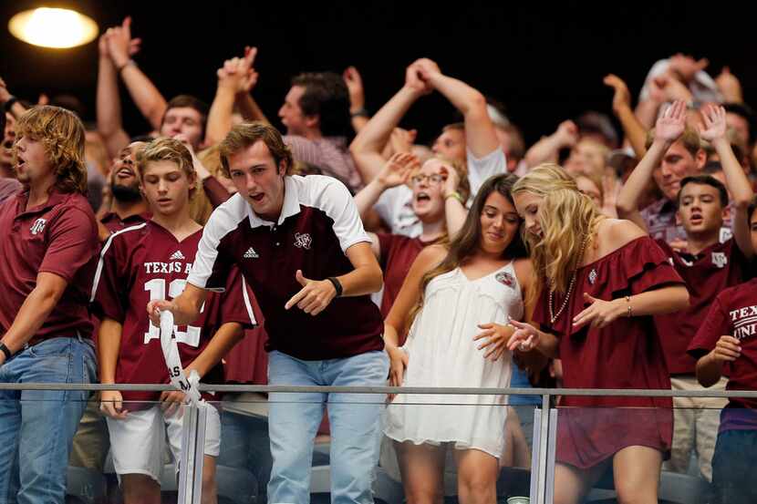 Texas A&M Aggies fans cheer during the second half of the Arkansas Razorbacks game at AT&T...