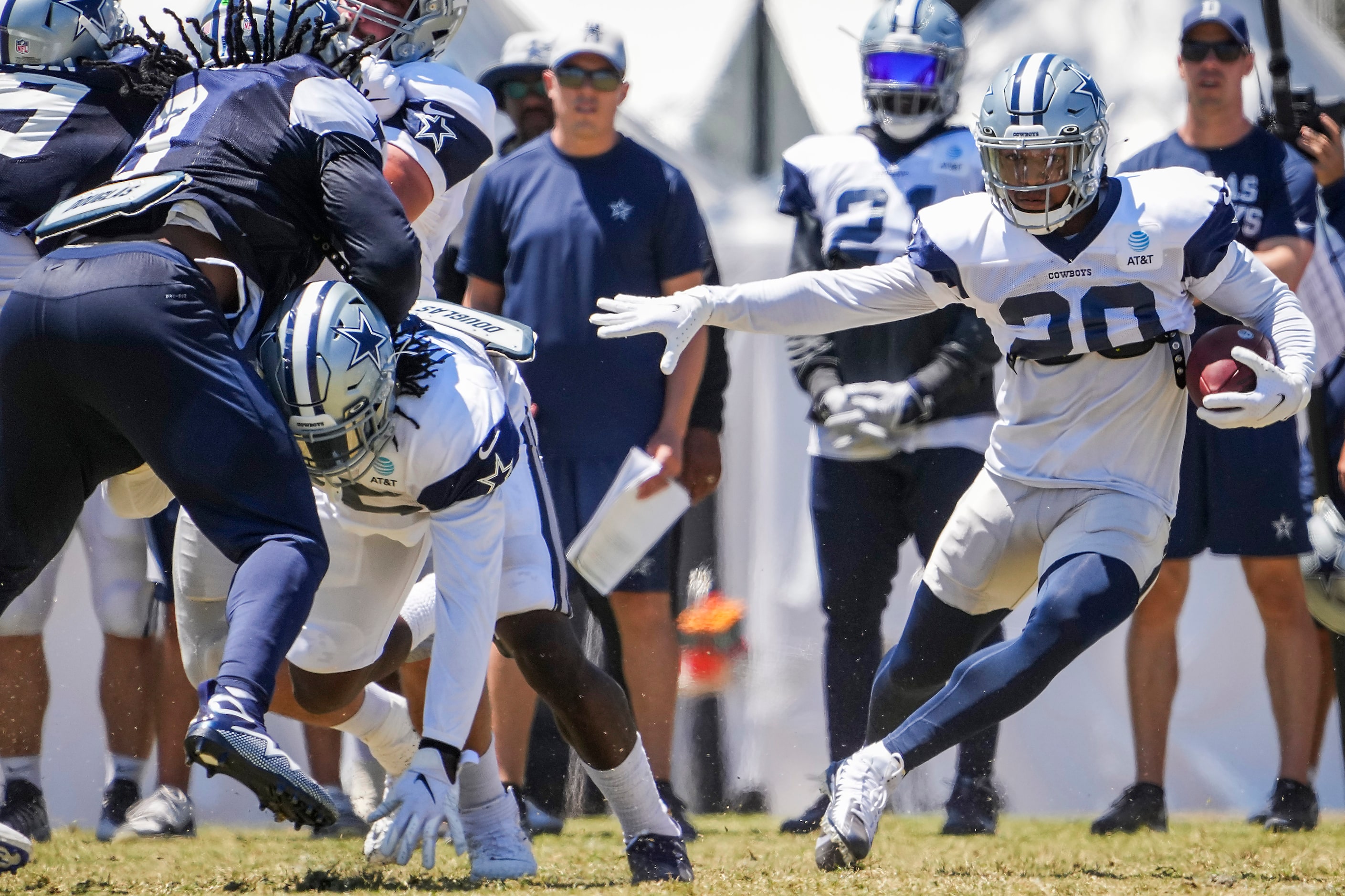 Dallas Cowboys running back Tony Pollard (20) runs the ball during a practice at training...