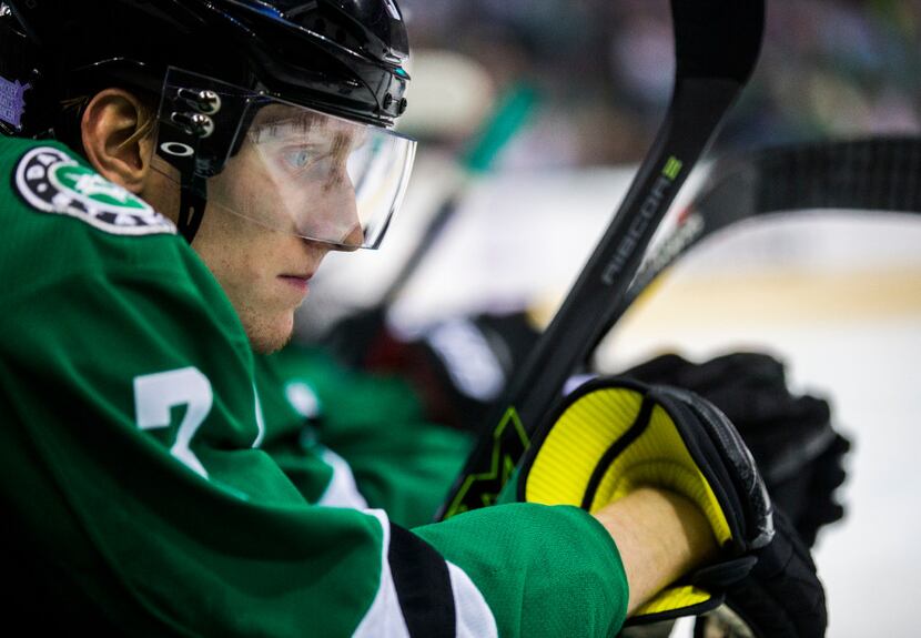 Dallas Stars defenseman John Klingberg (3) watches from the bench during the third period of...