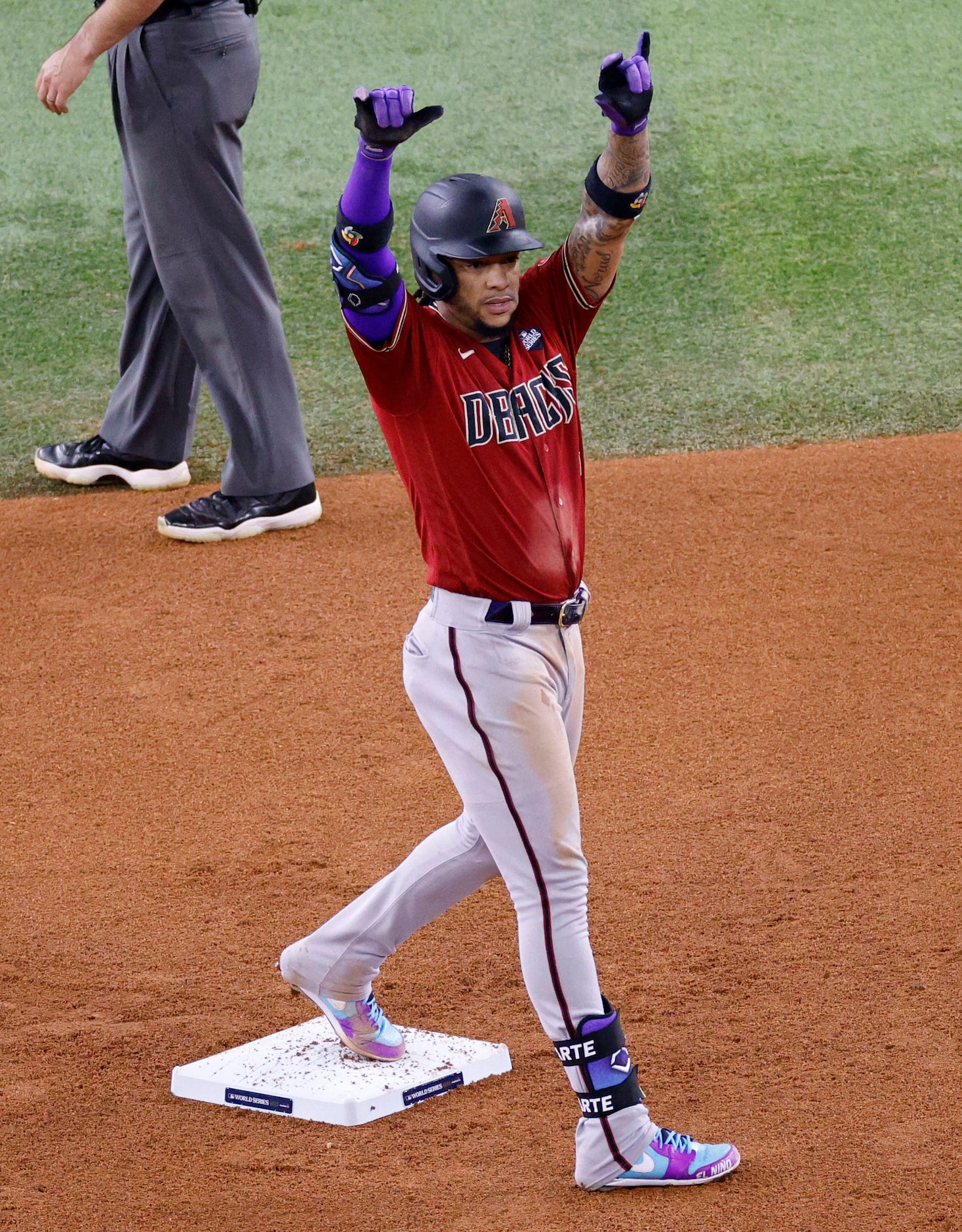 Arizona Diamondbacks second baseman Ketel Marte (4) gestures after he hit a RBI during the...