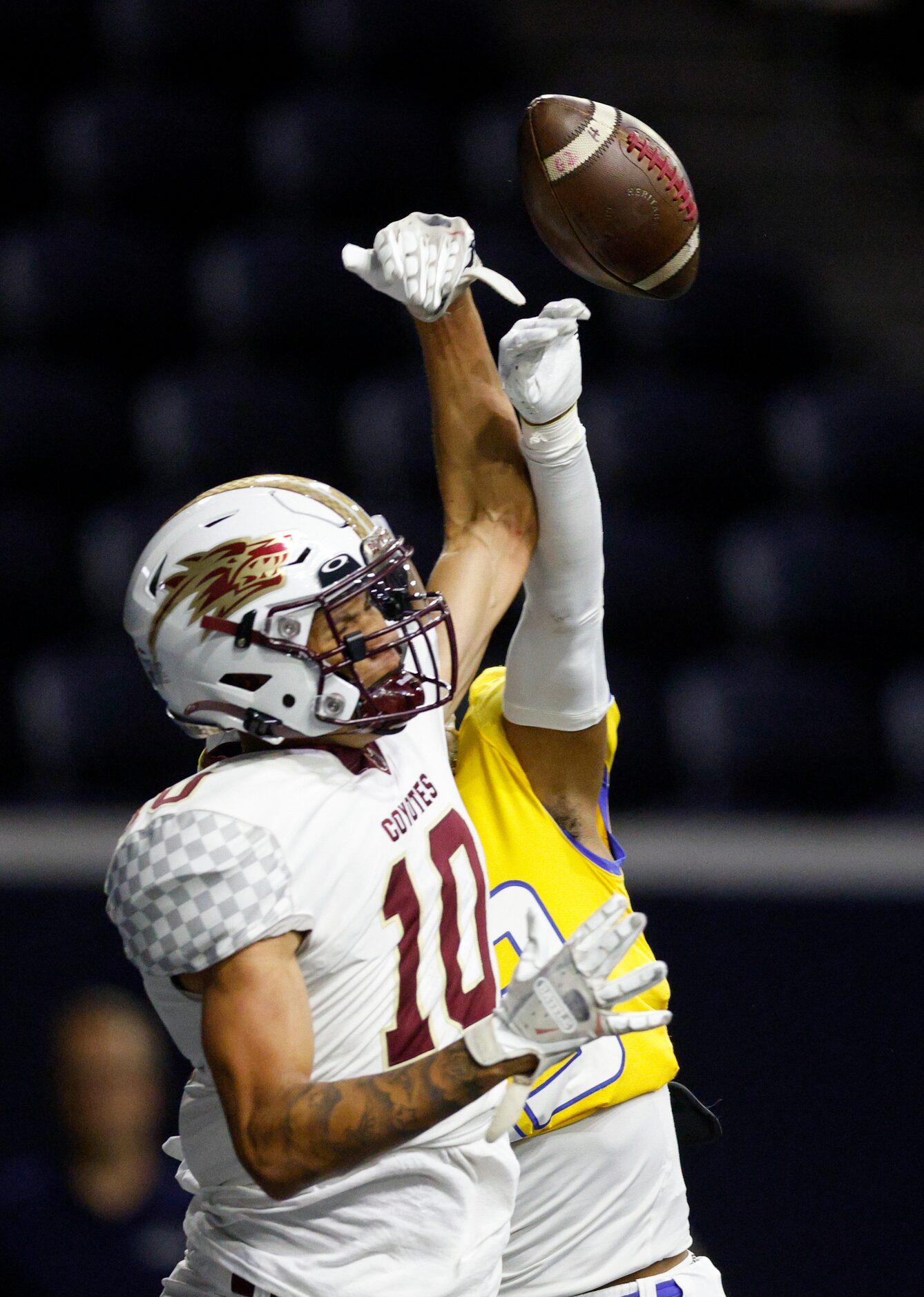 Frisco defensive back Jaylen Archibald (23) breaks up a pass intended for Frisco Heritage...