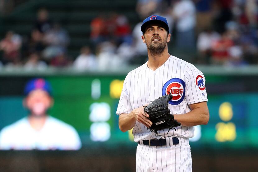 Chicago Cubs starting pitcher Cole Hamels stands on the mound before facing the New York...