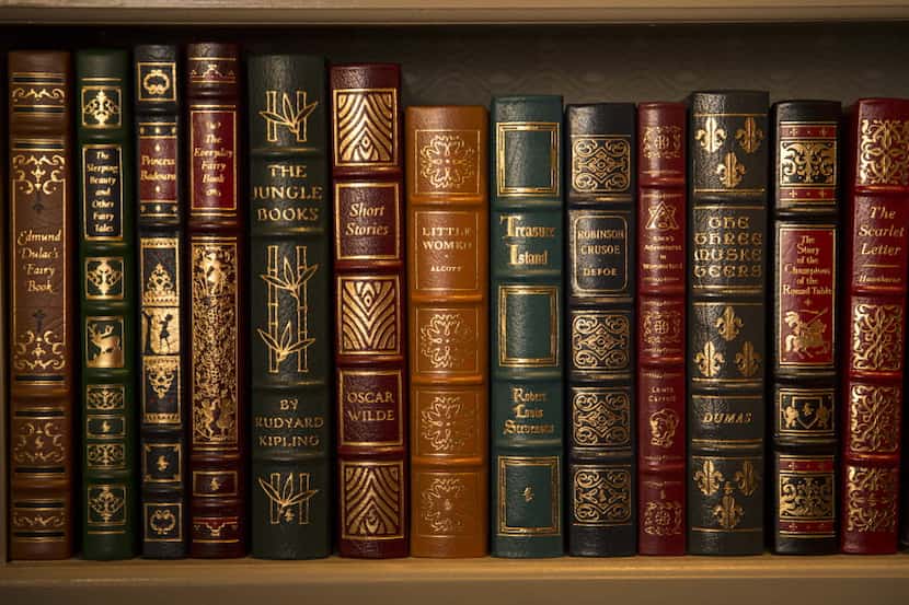 Classic novels in a bookshelf at the home of Alan Frakes and James Young, photographed...