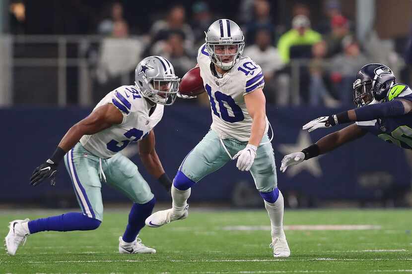 ARLINGTON, TX - DECEMBER 24:  Ryan Switzer #10 of the Dallas Cowboys carries the ball...