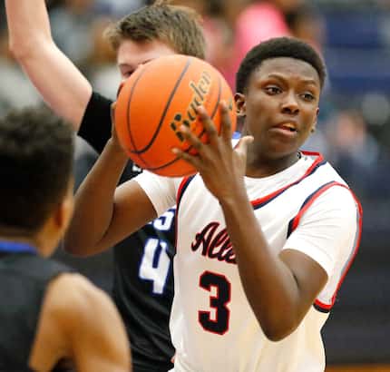 Allen forward Isaiah Stevens (3) looks for an outlet to pass during the first half as Allen...