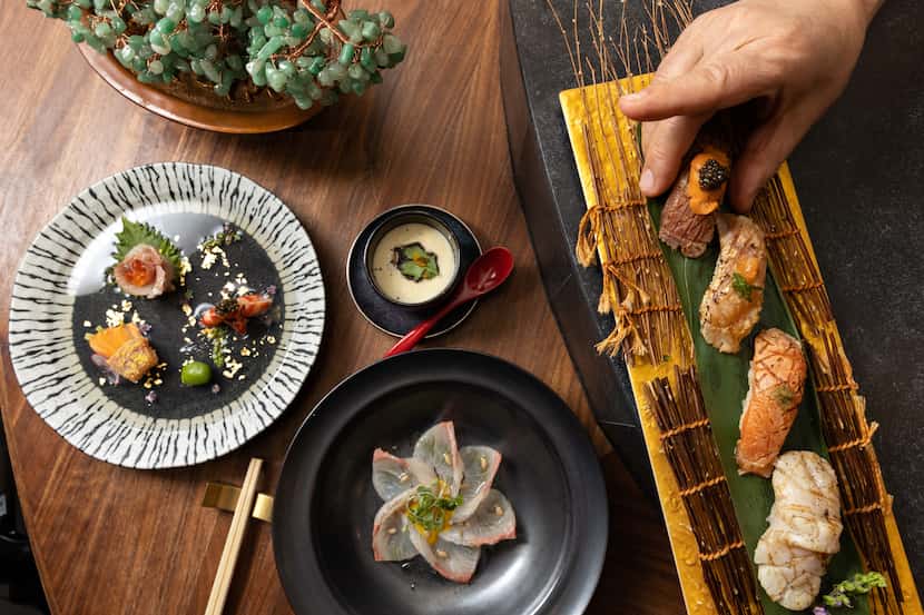 It’s up to the chefs to choose what you are served at Shoyo, a sushi omakase restaurant in...