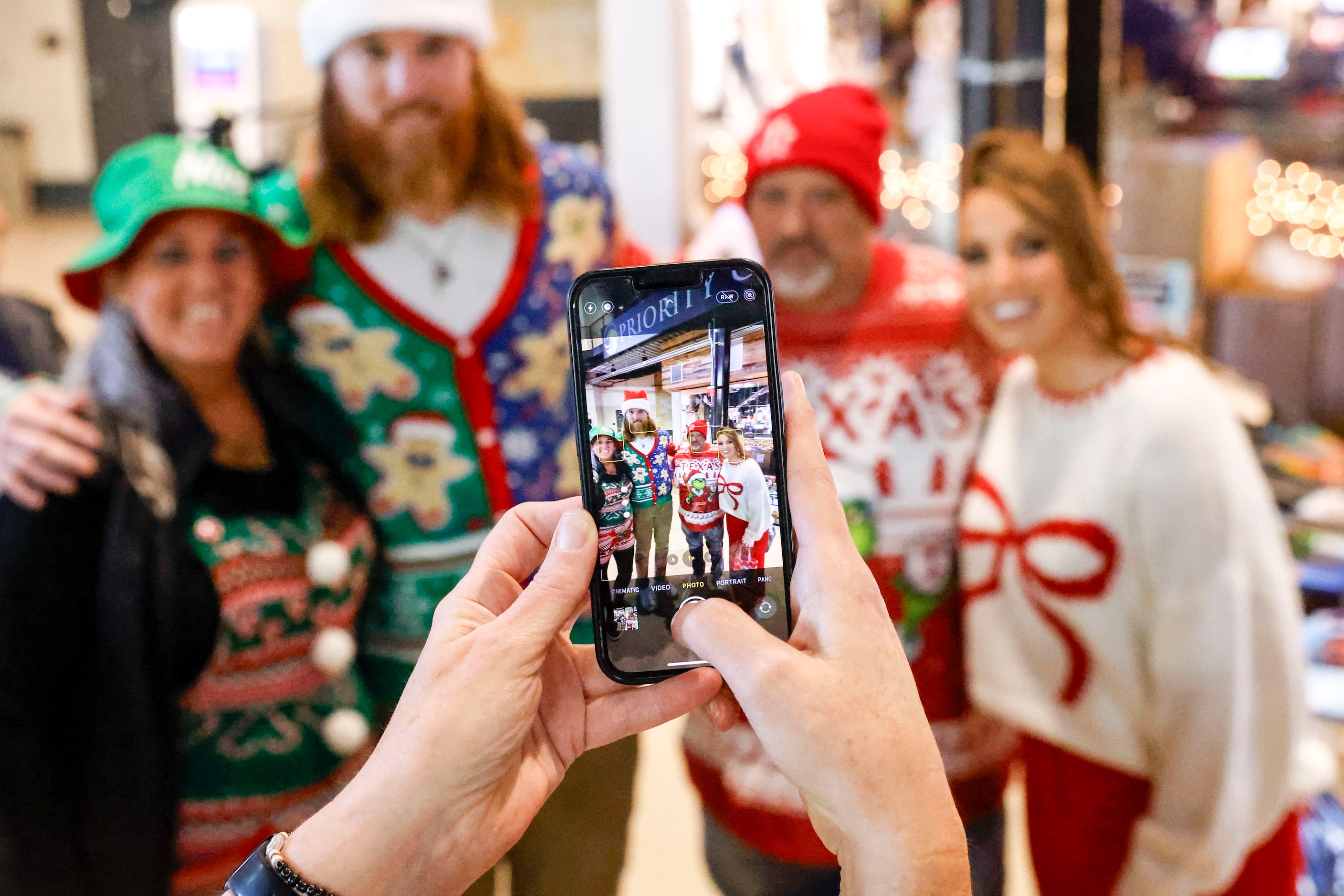 Texas Rangers pitcher Jon Gray takes photos with fans  during Texas Rangers Toy Drive on,...