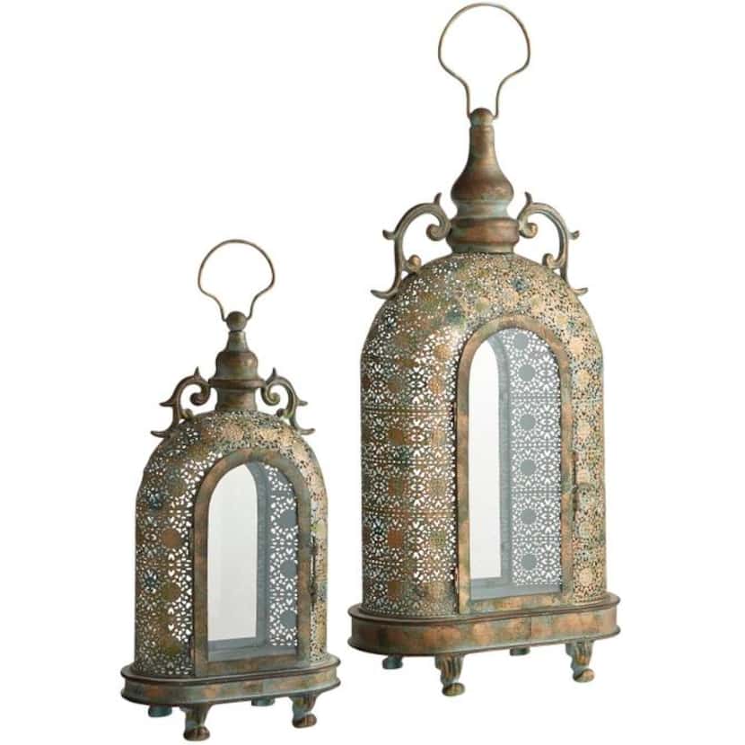 
Fancy footed. Made of iron and clear glass, these lanterns are inspired by 19th-century...