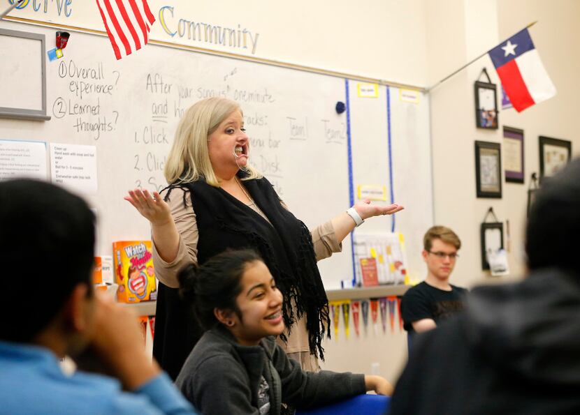 Sunnyvale High School teacher Becky Fisher plays a communication game with her video...