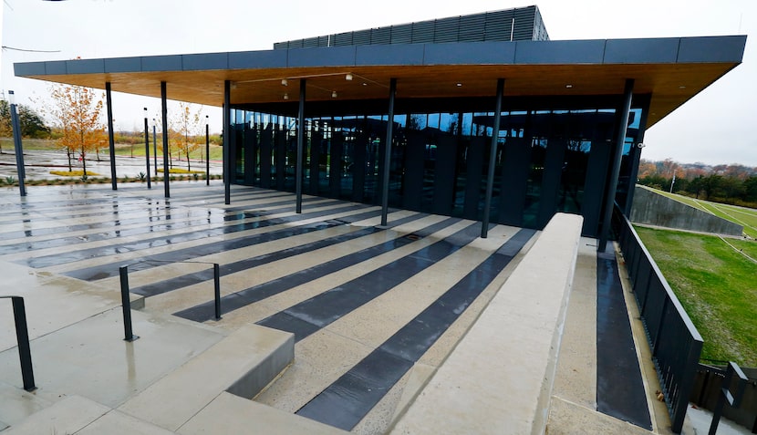 An exterior view of Singing Hills Recreation Center, where a large area between the center...