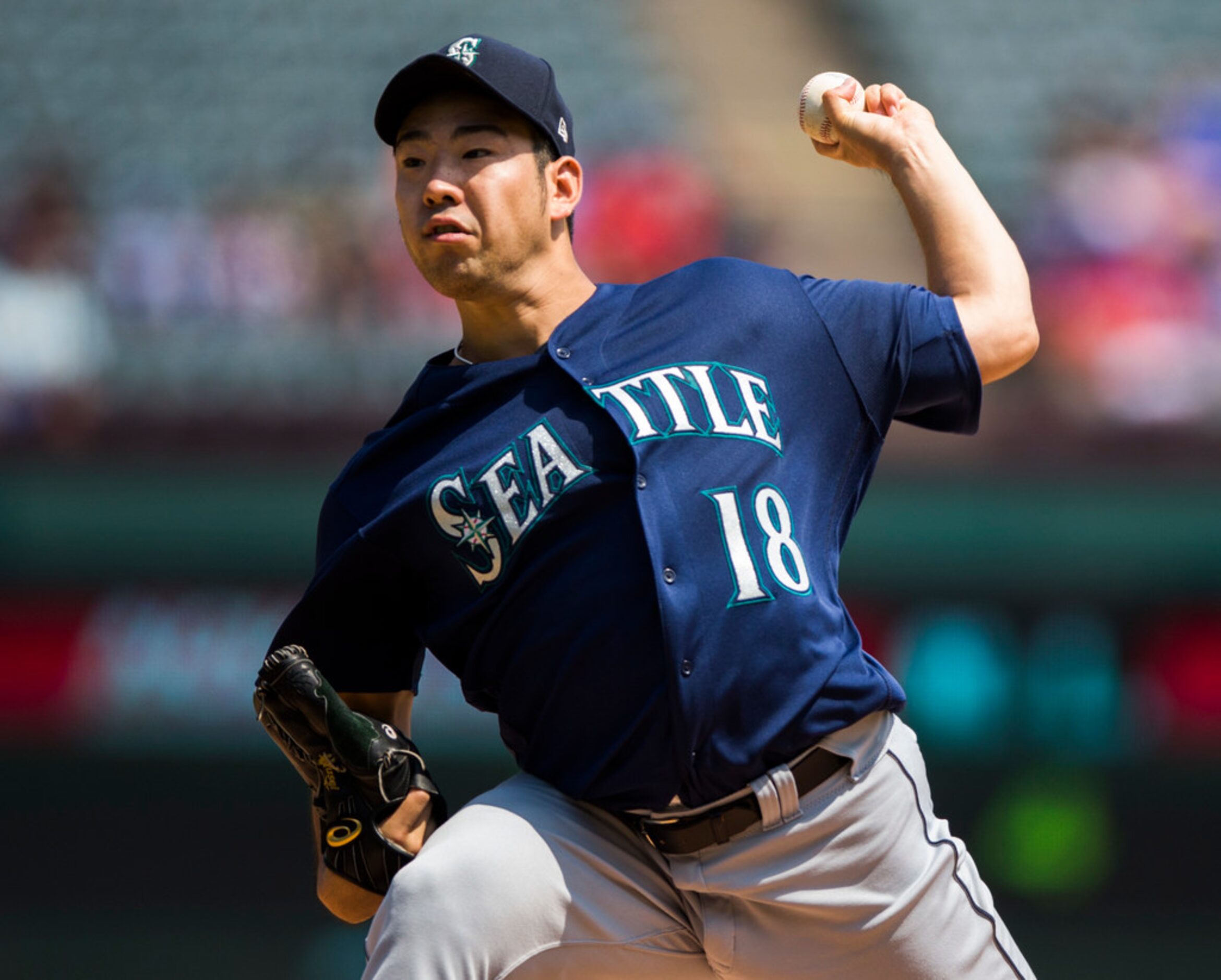 Seattle Mariners starting pitcher Yusei Kikuchi (18) pitches during the first inning of an...