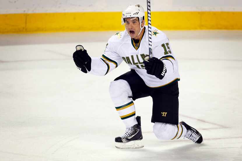 Dallas Stars' Jamie Langenbrunner celebrates his goal during second-period NHL hockey game...