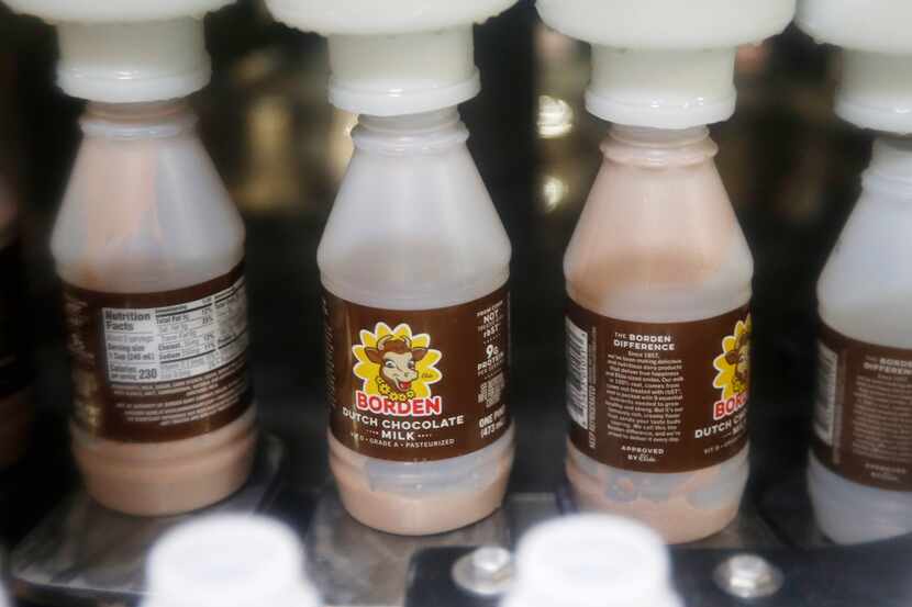 Bottles of Borden dutch chocolate milk are filled on the bottling line at Borden Dairy in...