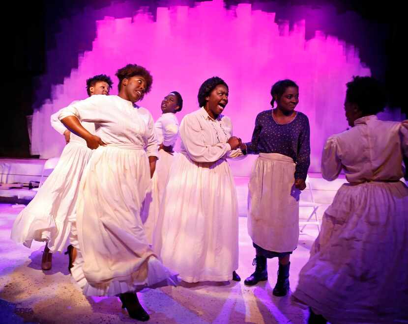 
The female cast including lead Ebony Marshall Oliver (Celie), second from right, perform a...
