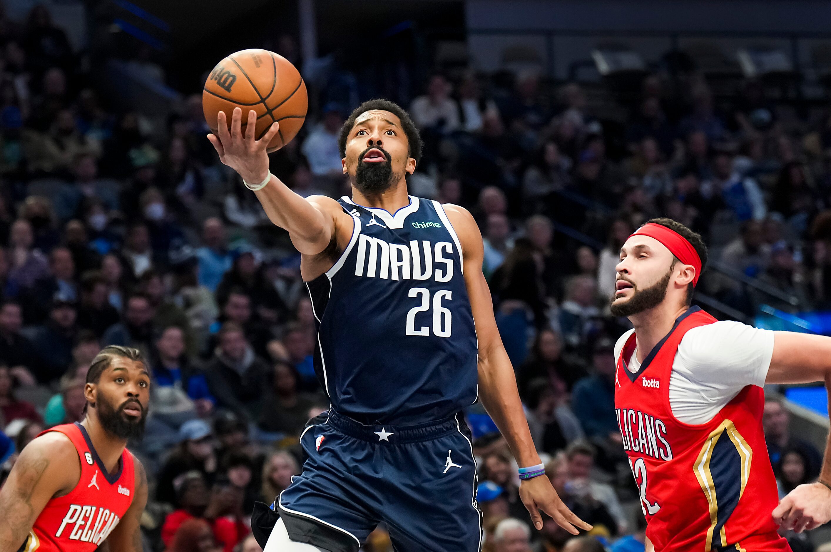 Dallas Mavericks guard Spencer Dinwiddie (26) scores past New Orleans Pelicans forward Larry...