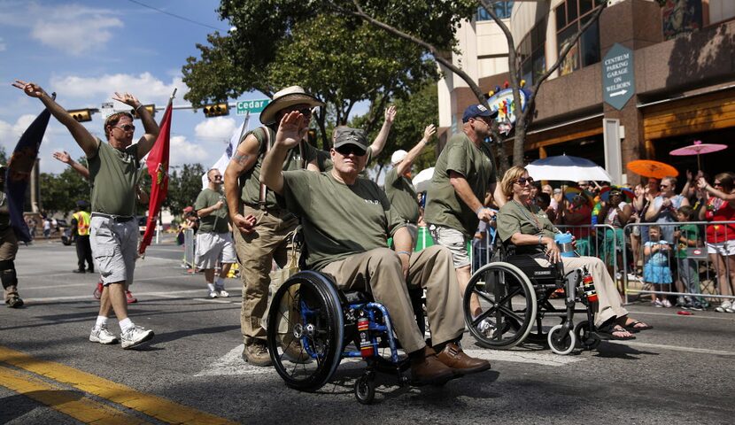 A group from Veterans for Diversity march in the Alan Ross Texas Freedom Parade on Cedar...