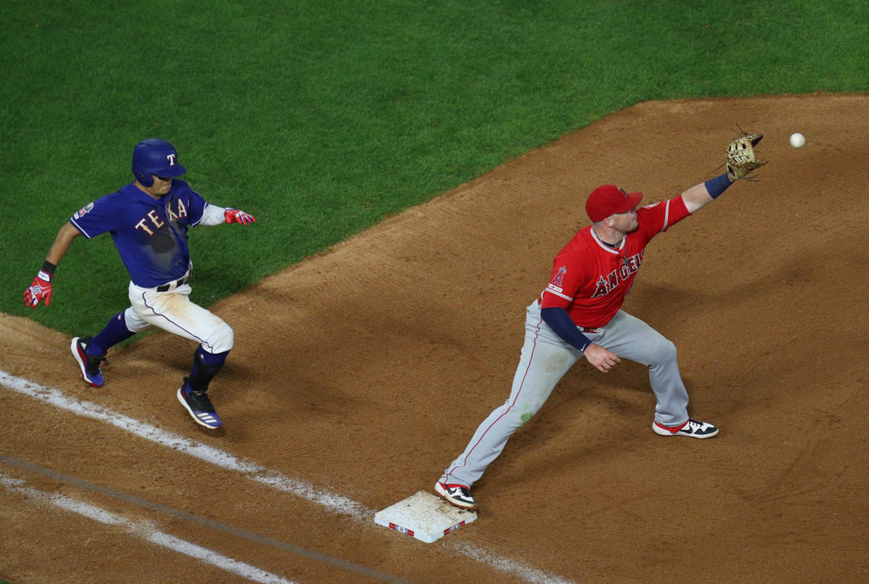 ARLINGTON, TEXAS - APRIL 17: Shin-Soo Choo #17 of the Texas Rangers is unable to beat the...